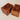 Two wooden puzzle boxes on a light background