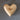 Wooden heart-shaped object with 'hope' engraved on a gray background