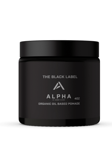 Black jar of Alpha grooming product on a black background