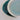 Stack of ceramic plates with textured turquoise and white design on a light gray background