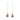 Pair of earrings with red gemstones on a white background