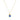 Gold necklace with a blue gemstone pendant on a white background