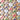 Heart-shaped wooden stamps with colorful awareness ribbons on a brown background