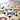 Wooden tiles with colorful ribbons on a blurred background