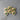 Wooden hearts with green ribbons on a gray surface