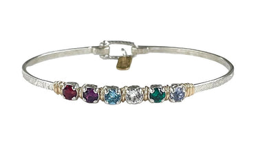 Silver bracelet with colorful gemstones on a white background