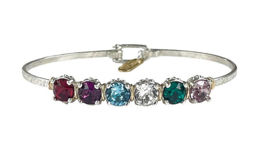 Silver bracelet with multicolored gemstones on a white background