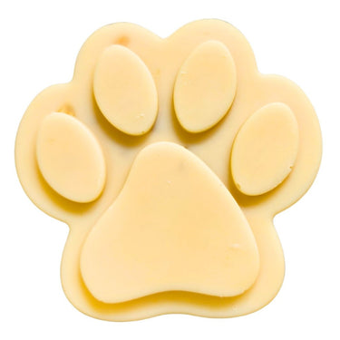Big Paw Dog Shampoo that is shaped like a paw print on a white background