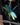 Metallic dragonfly-shaped object on a black background