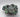 Emerald City Blossom Bowl with green and brown hues on a white background