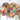 Heart-shaped patchwork wall hanging held by a person