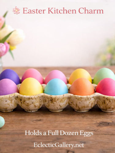 Colorful Easter eggs in a Ceramic Egg Carton on a wooden surface with tulips in the background.