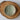 Ceramic Ring dish with textured design on a wooden surface