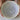 Person holding a ceramic bowl with a textured interior