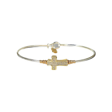 Bangle with a gold cross charm on a white background