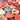 Colorful heart-shaped wooden blocks with various designs and text.