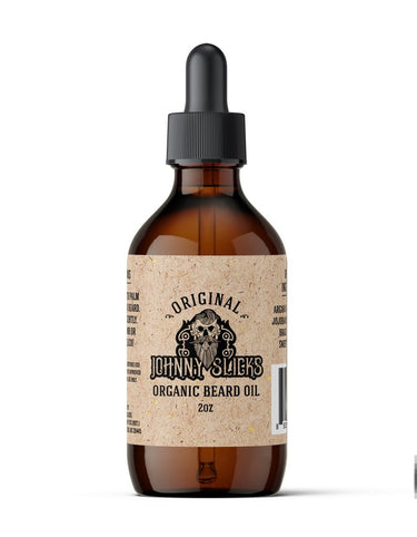 Brown glass bottle of Johnny Slicks Organic Beard Oil with a dropper on a white background
