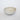 Speckled ceramic bowl on a light gray background