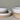 Set of ceramic bowls with white and beige gradient on a neutral background
