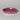 Pink ceramic dish on a gray background