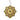 Decorative gold ornament with intricate patterns on a white background