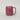 Pink ceramic mug on a light gray background