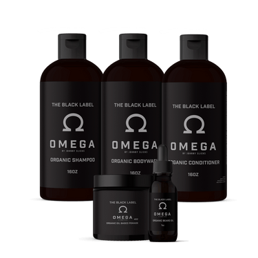 Set of 'The Black Label Omega' grooming products on a black background