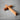 Wooden cross on a gray surface