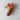 Wooden cross with multicolored stripes on a light gray background