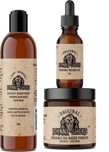 Three bottles of Johnny Slicks organic grooming products on a white background