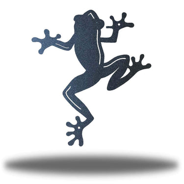 Metal wall art of a frog silhouette on a white background