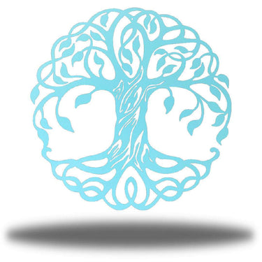 Decorative metal art piece with a tree design on a white background