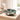 Washed Ashore Beach Bowl on a wooden surface with a lamp and books in the background