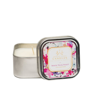 Soy Lotion Candle in a decorative tin with a floral design on a white background