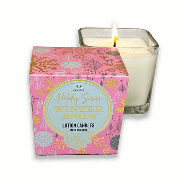 Winter Snow Soy Lotion Candle in a glass jar with a pink box labeled 'Winter Snow' on a white background