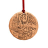 Wooden ornament with engraved scenes and a red ribbon on a white background
