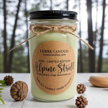 LUXXE CANDLES Alpine Stroll candle with a forest background