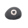 Black stone with a silver heart-shaped engraving on a white background