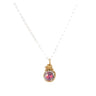 Necklace with a gold pendant featuring a pink gemstone on a white background