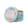 Candle tin with colorful lid featuring 'Key West Candle & Bath Co.' branding on a white background.