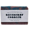 Bar of Blueberry Cobbler Goat Milk Soap with 'Blueberry Cobbler' label on a white background