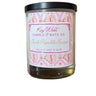 Candle with a label from Key West Candle & Bath Co. on a white background
