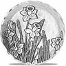 Decorative stone with floral design on a white background