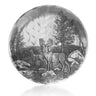 Decorative plate with a deer and forest design on a white background