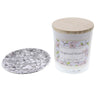 Dogwood Dreams Candle with a matching decorative plate on a white background