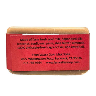 Fern Valley Goat Milk Soap with red label and wooden top on a white background