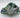 Emerald City Blossom Bowl with green and blue iridescent finish on a white background