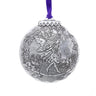 Silver fairy ornament with floral design on a white background