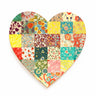 Heart-shaped patchwork quilt with colorful floral patterns on a white background