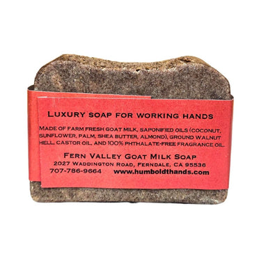 Bar of Natural goat milk hand soap for hardworking hands a white background